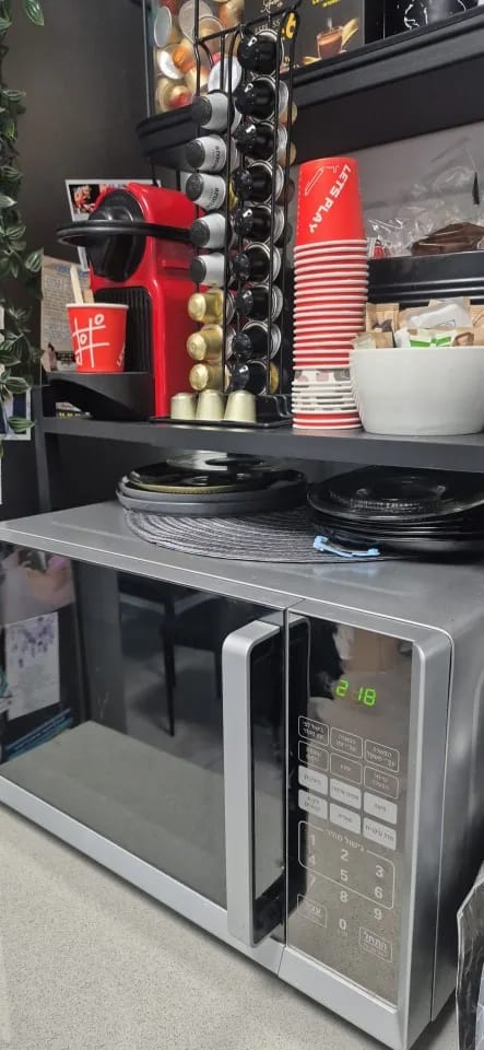 Customer photo review of Expandable Microwave Shelf with 6 Hooks Kitchen Storage Rack Extendable 40-64cm
