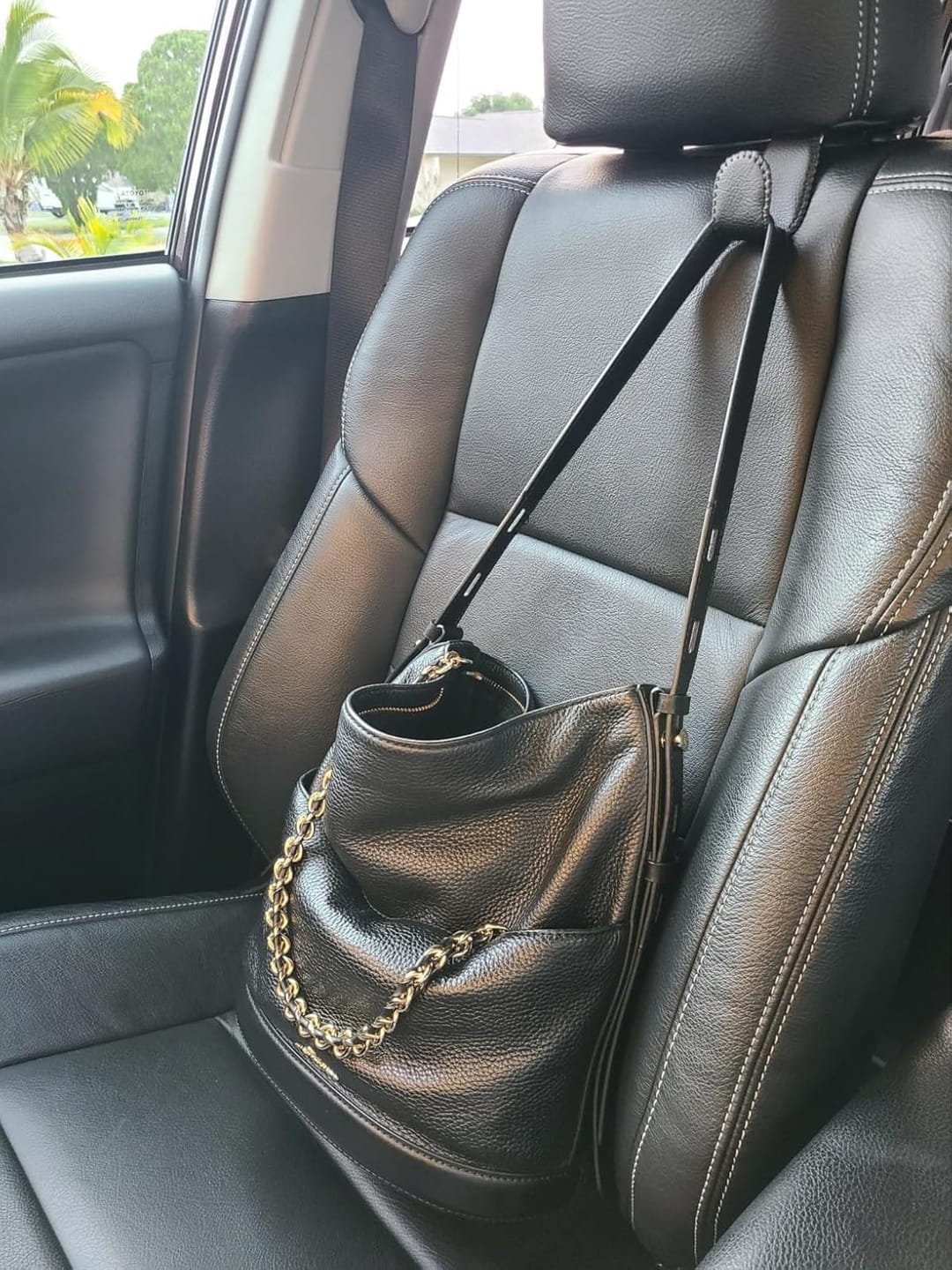 Customer photo review of BOLTHUT™ Leather Car Headrest Hooks — Back-Seat Bag Hangers