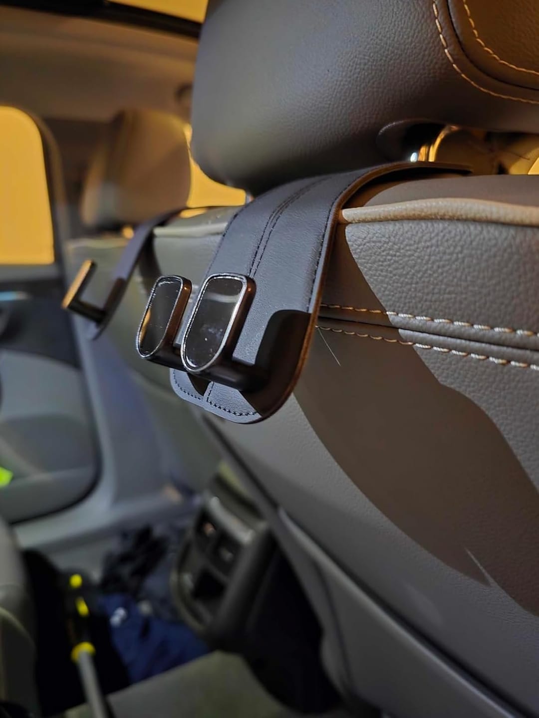 Customer photo review of BOLTHUT™ Leather Car Headrest Hooks — Back-Seat Bag Hangers