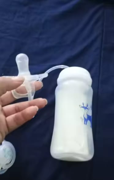 Customer photo review of Latido Eterno™ Biberón 3 en 1