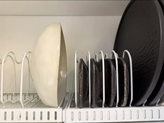 Customer photo review of Under-Cabinet Sliding Pots and Pans Organizer with 8 Adjustable Dividers