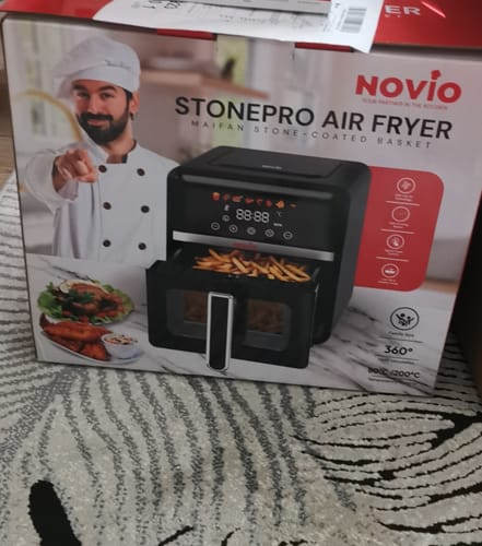 Customer's packaging box for the Novio StonePro Air Fryer, featuring a chef image and product illustrations.