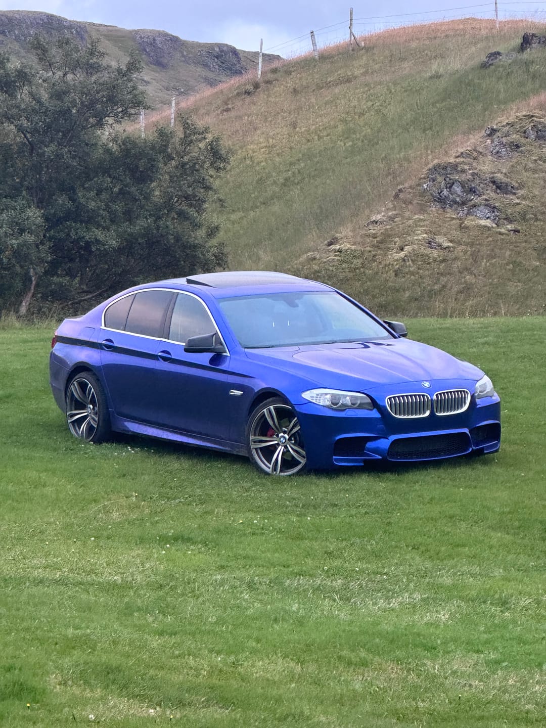 Customer photo review of Glossy Metallic Deep Blue Vinyl Wrap