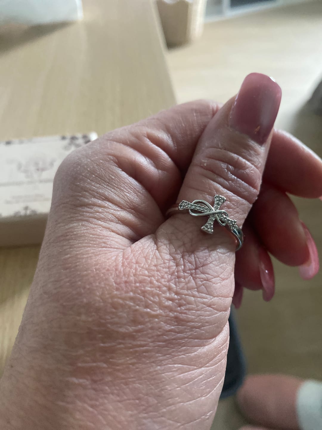 Customer photo review of Christianartworkshop Golden/Silver Mobius Cross Ring: Carry His Grace in Daily Wear