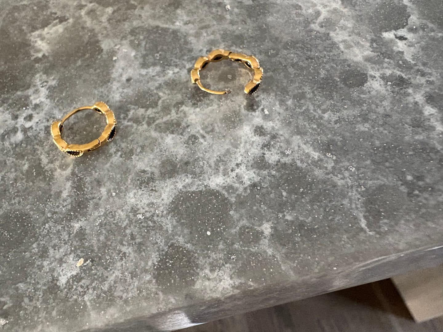 Customer photo review of Onyx Tiny Hoop Earrings