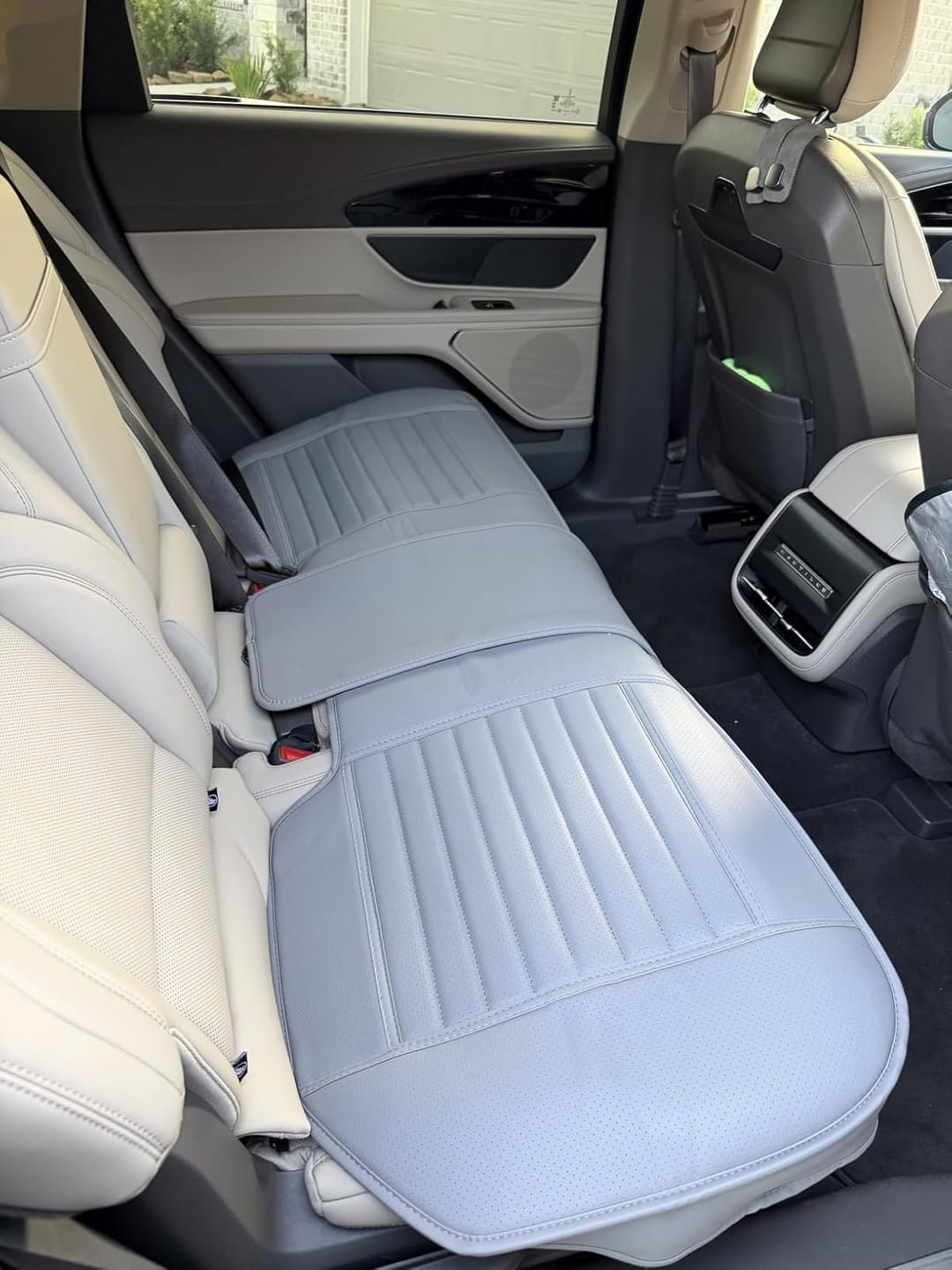 Customer photo review of BOLTHUT™ Leather Car Headrest Hooks — Back-Seat Bag Hangers