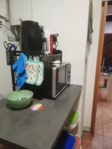 Customer photo review of Expandable Microwave Shelf with 6 Hooks Kitchen Storage Rack Extendable 40-64cm