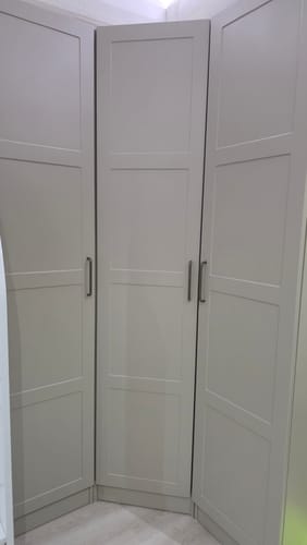 Customer's three Rani Membran Kapaklı Gardırop units in sandstone color, installed side-by-side in a room corner.