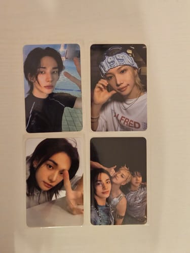 Customer's four Stray Kids THIS & THAT Soundwave lucky draw photocards featuring individual and group photos.
