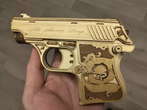 Customer photo review of ROKR Mini Gun Wooden 3D Puzzle Toy Gun