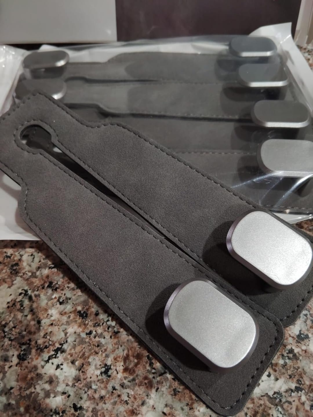 Customer photo review of BOLTHUT™ Leather Car Headrest Hooks — Back-Seat Bag Hangers