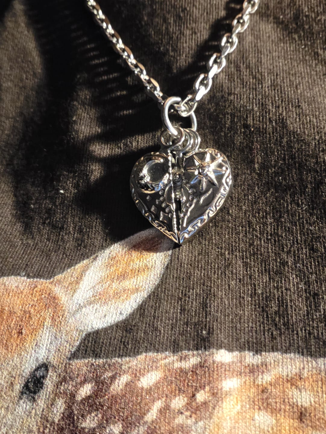 Customer photo review of COSMIC HEART PENDANT