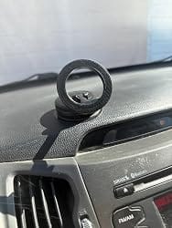 Customer photo review of Foldable Vacuum Suction Cup Phone Holder – Double-Sided Magnetic Desk Stand for iPhone & Android
