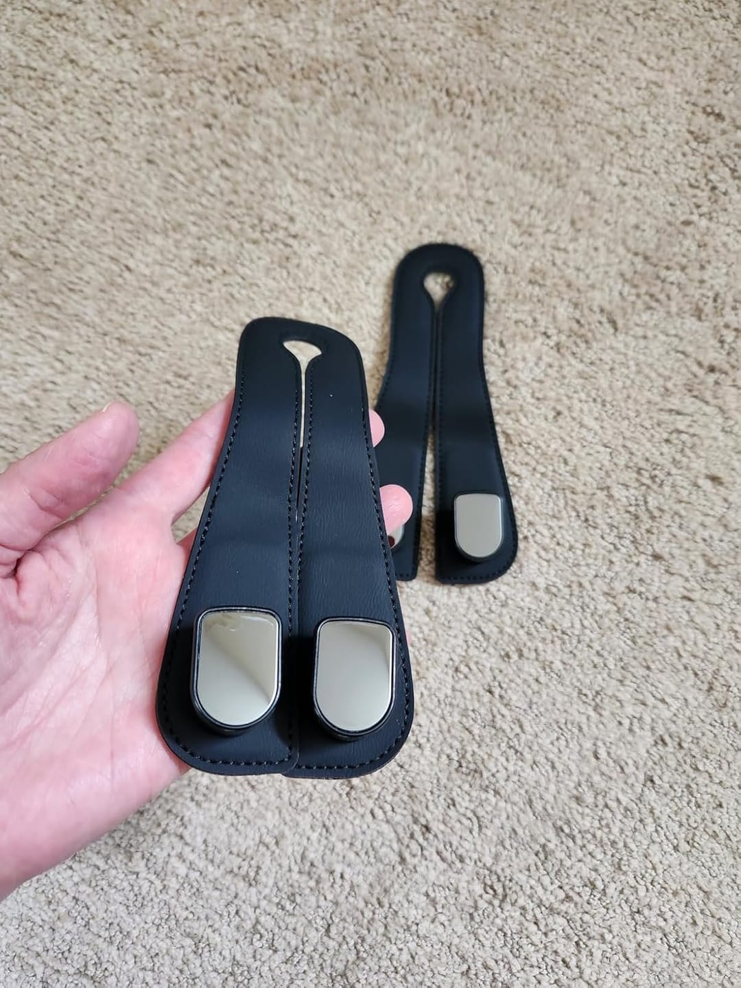 Customer photo review of BOLTHUT™ Leather Car Headrest Hooks — Back-Seat Bag Hangers
