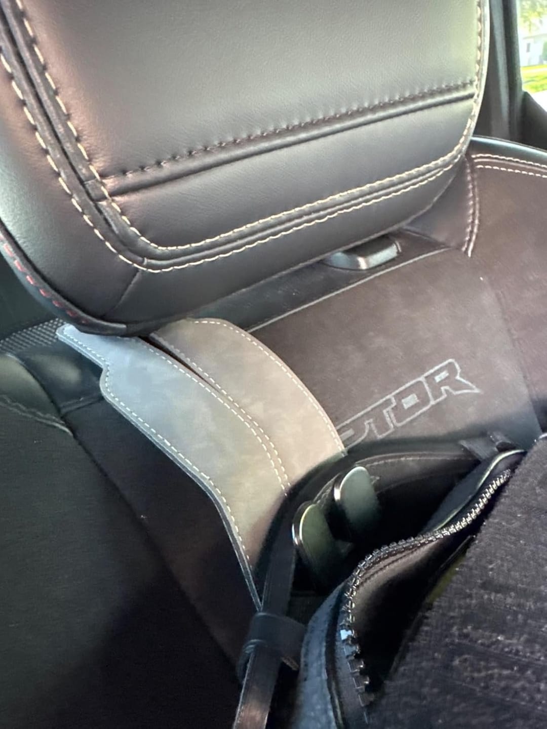 Customer photo review of BOLTHUT™ Leather Car Headrest Hooks — Back-Seat Bag Hangers