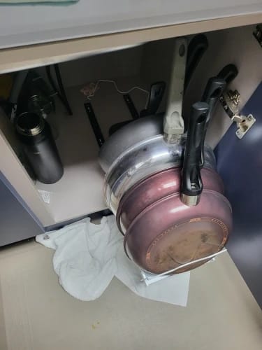 Customer photo review of Under-Cabinet Sliding Pots and Pans Organizer with 8 Adjustable Dividers