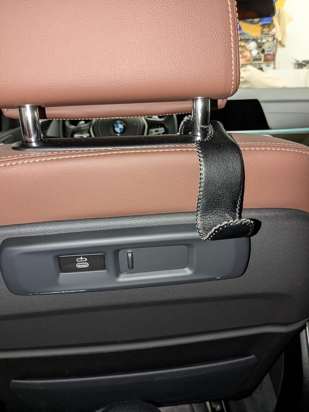 Customer photo review of BOLTHUT™ Leather Car Headrest Hooks — Back-Seat Bag Hangers