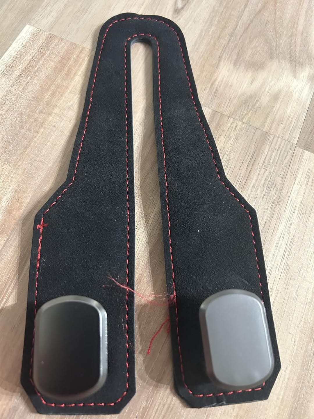 Customer photo review of BOLTHUT™ Leather Car Headrest Hooks — Back-Seat Bag Hangers