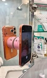 Customer photo review of Foldable Vacuum Suction Cup Phone Holder – Double-Sided Magnetic Desk Stand for iPhone & Android