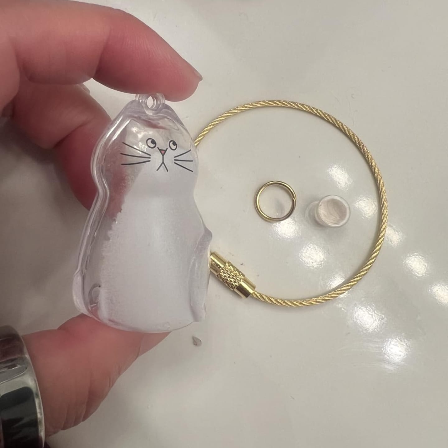 Customer photo review of Llavero para guardar pelo de mascota