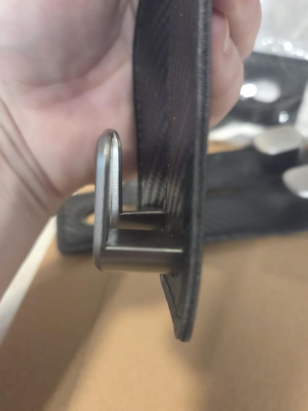 Customer photo review of BOLTHUT™ Leather Car Headrest Hooks — Back-Seat Bag Hangers