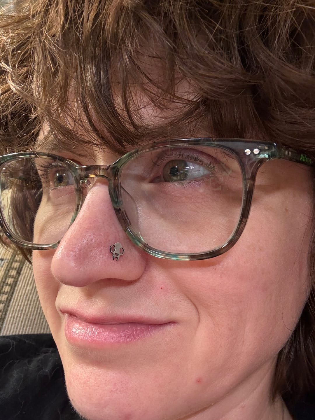 Customer photo review of Cat Skull Silhouette Nose Stud + Earring
