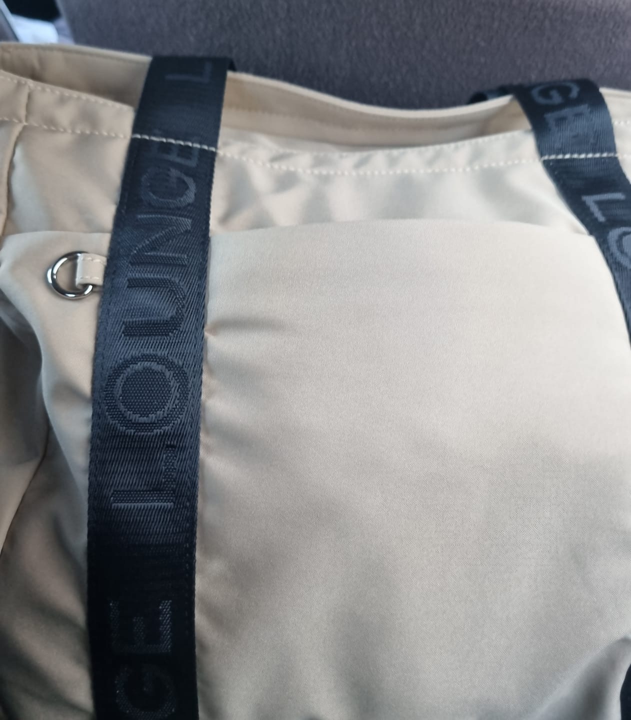 Customer photo review of Bolso Nylon Llavero Street