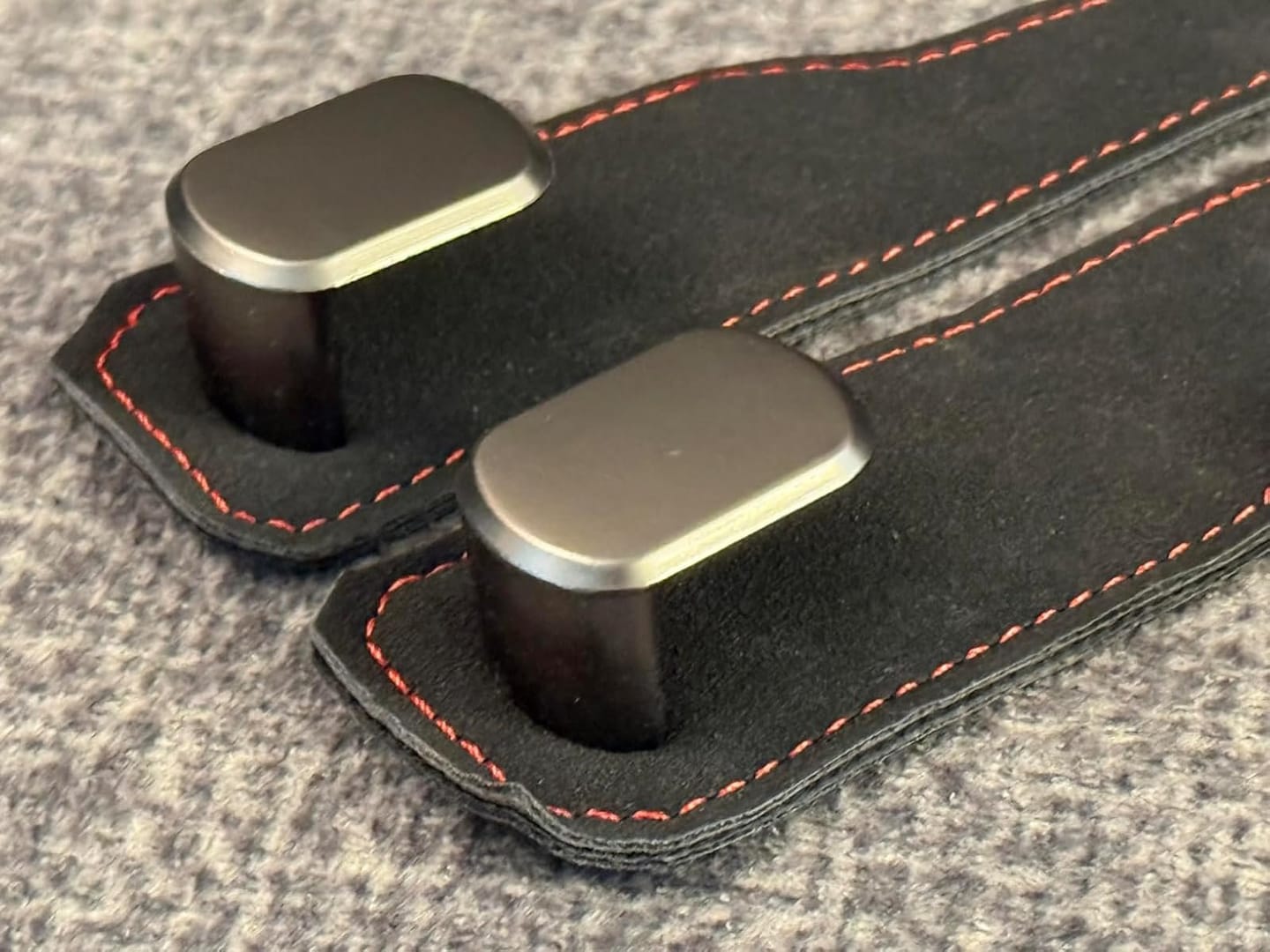 Customer photo review of BOLTHUT™ Leather Car Headrest Hooks — Back-Seat Bag Hangers