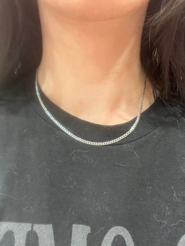 Customer's stainless steel curb chain being worn around the neck.