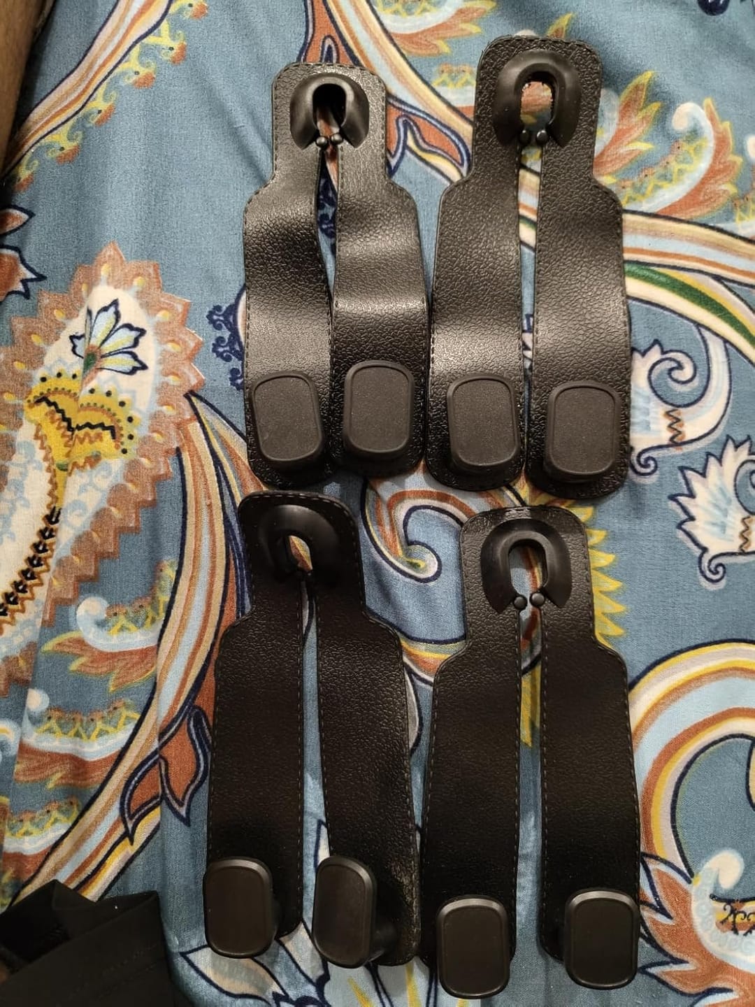 Customer photo review of BOLTHUT™ Leather Car Headrest Hooks — Back-Seat Bag Hangers