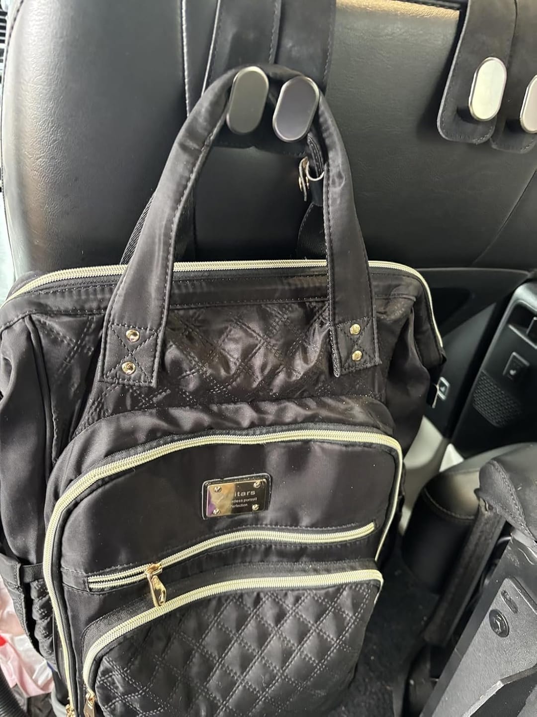 Customer photo review of BOLTHUT™ Leather Car Headrest Hooks — Back-Seat Bag Hangers