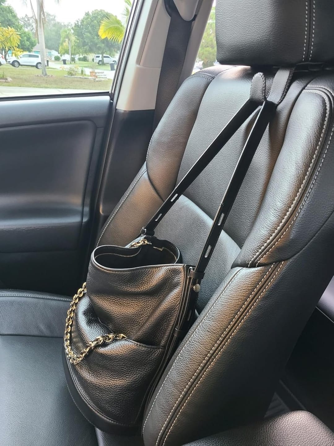 Customer photo review of BOLTHUT™ Leather Car Headrest Hooks — Back-Seat Bag Hangers