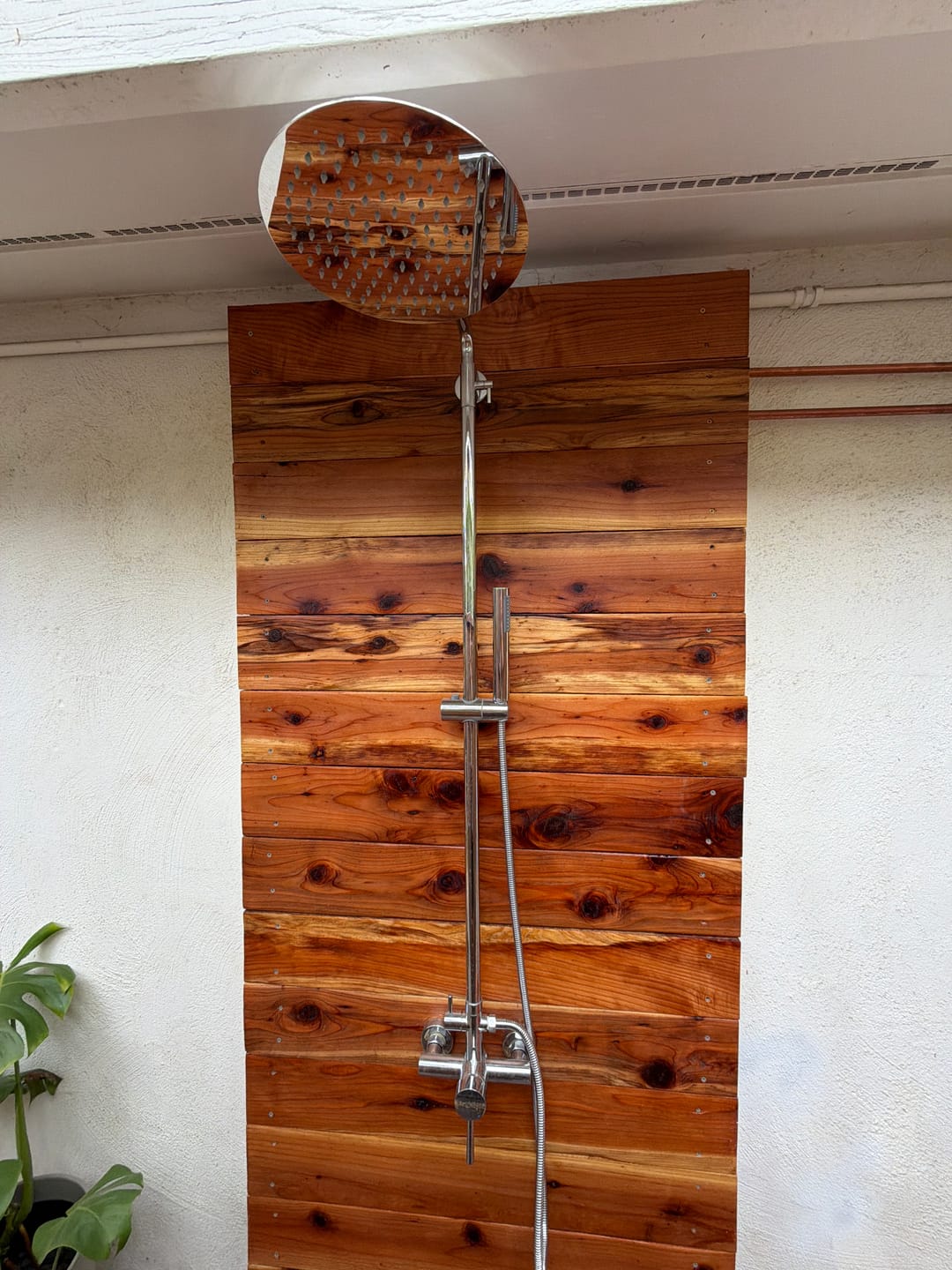 Customer photo review of Outdoor Shower Fixture with 304 Stainless Steel 10-Inch Rainfall Shower Head and Adjustable Slide Bar