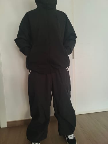 Customer's black Men's Multi-Pocket Snow Jacket worn in a baggy fit.