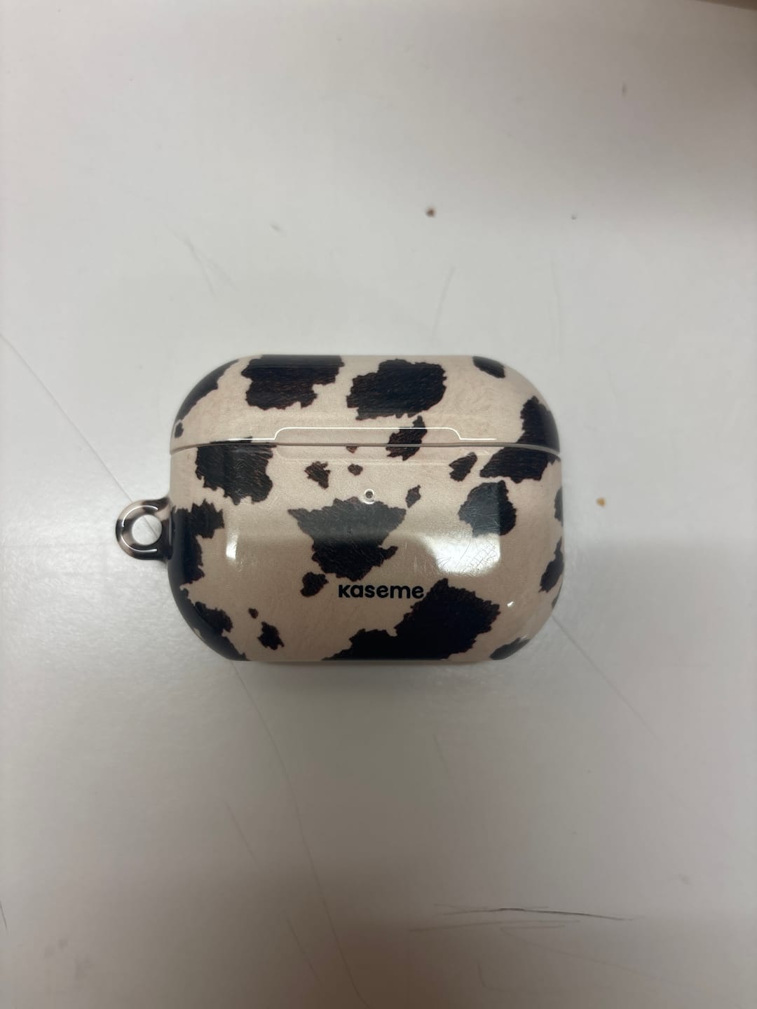 Customer photo review of Cowboy Latte AirPods Case