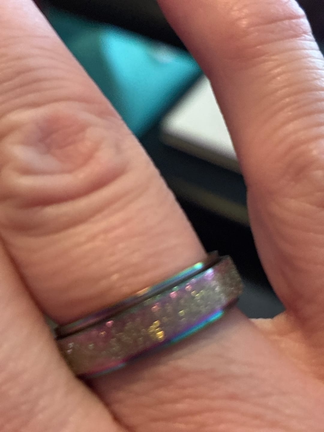 Customer photo review of Frosted Rainbow Anxiety Fidget Ring Spinner