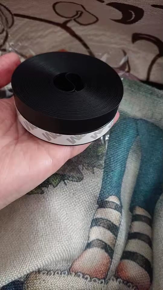Customer photo review of Door Weather Seal | Adhesive Draft Stopper for Doors & Windows