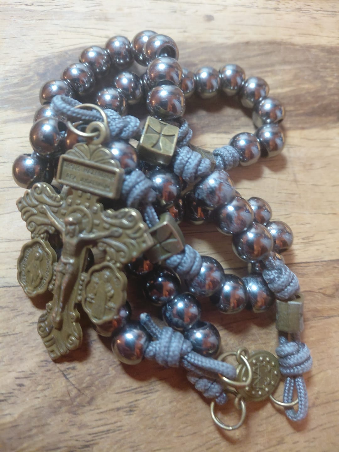 Customer photo review of FREE Today: Miraculous Medal & Crucifix of 8 mm Round Silver Black Gallstone Nylon Cord Rosary