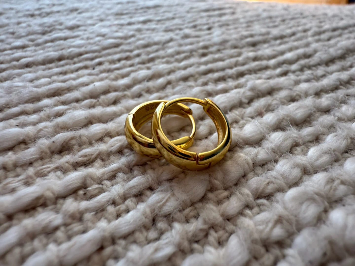 Customer photo review of PREMIUM STERLING SILVER HOOP EARRINGS