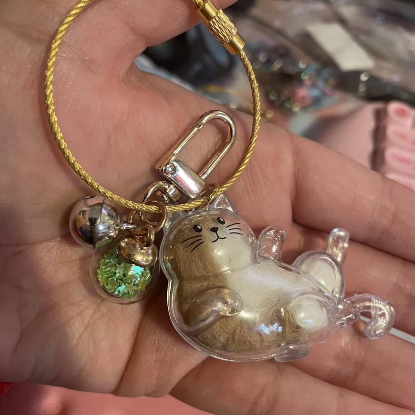 Customer photo review of Llavero para guardar pelo de mascota