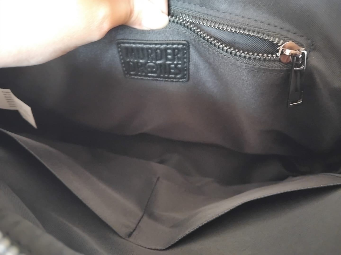 Customer photo review of Murder Drones Laptop Bag