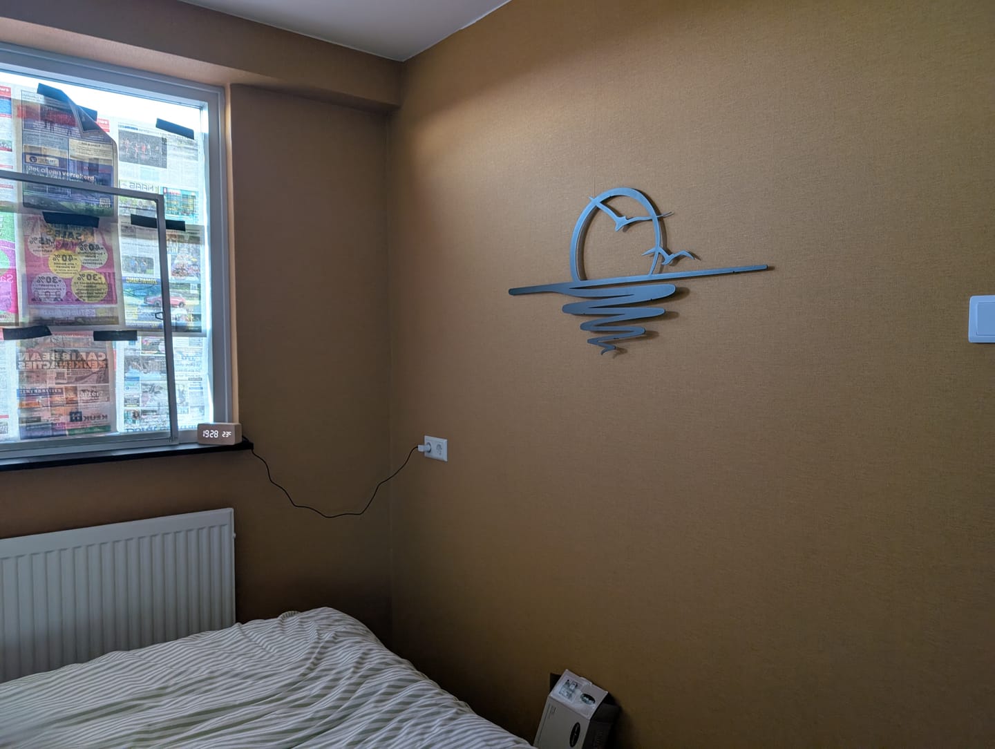 Customer photo review of Décoration murale en métal - Coucher du soleil (SUN.04)