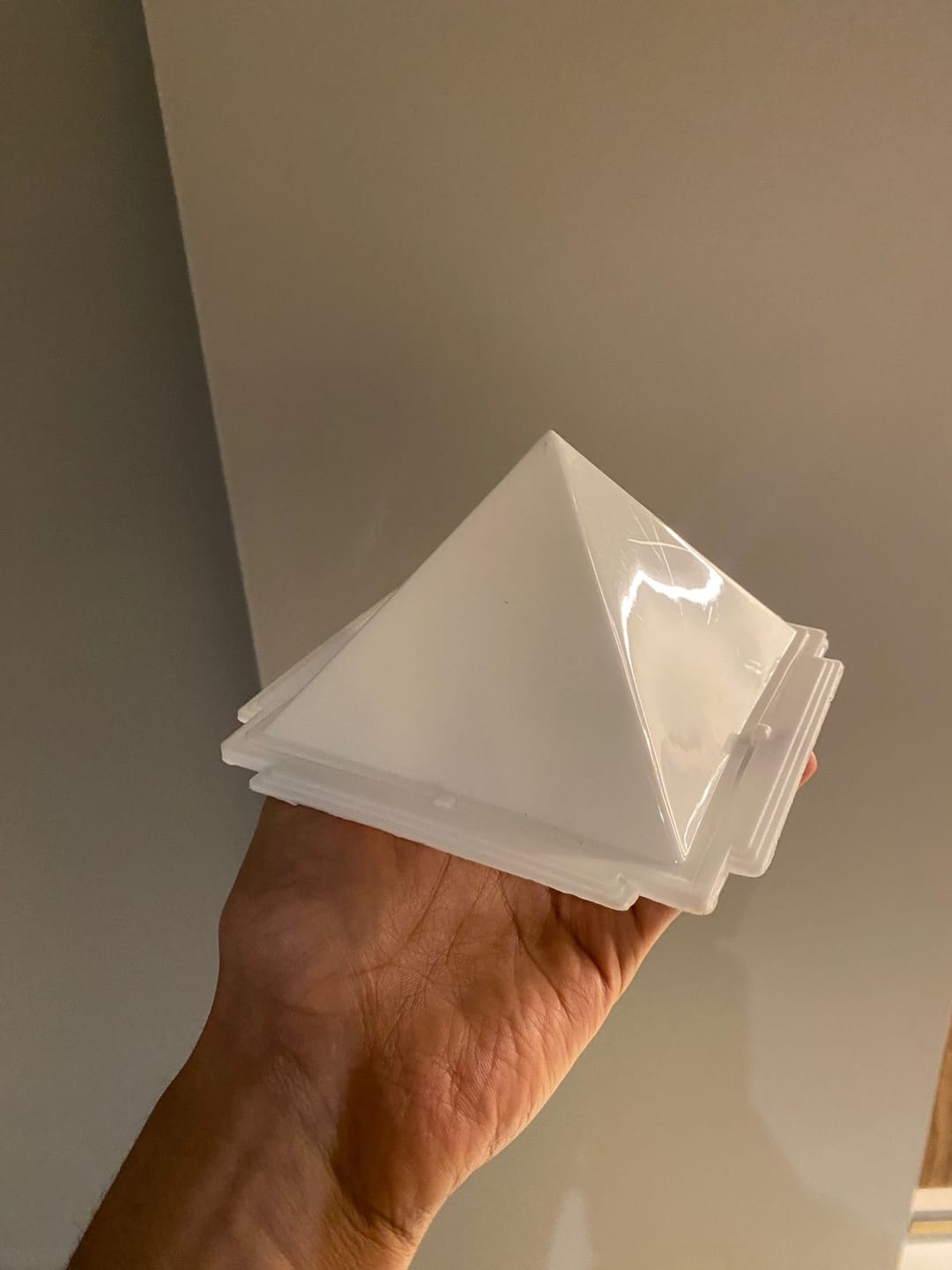 Customer photo review of 3-Layer Plastic Vastu Pyramid – Energy Balancing Vastu Remedy for Health & Wealth | Ideal for Entrance, Main Door & Kitchen | 13 x 13 cm | 50 g