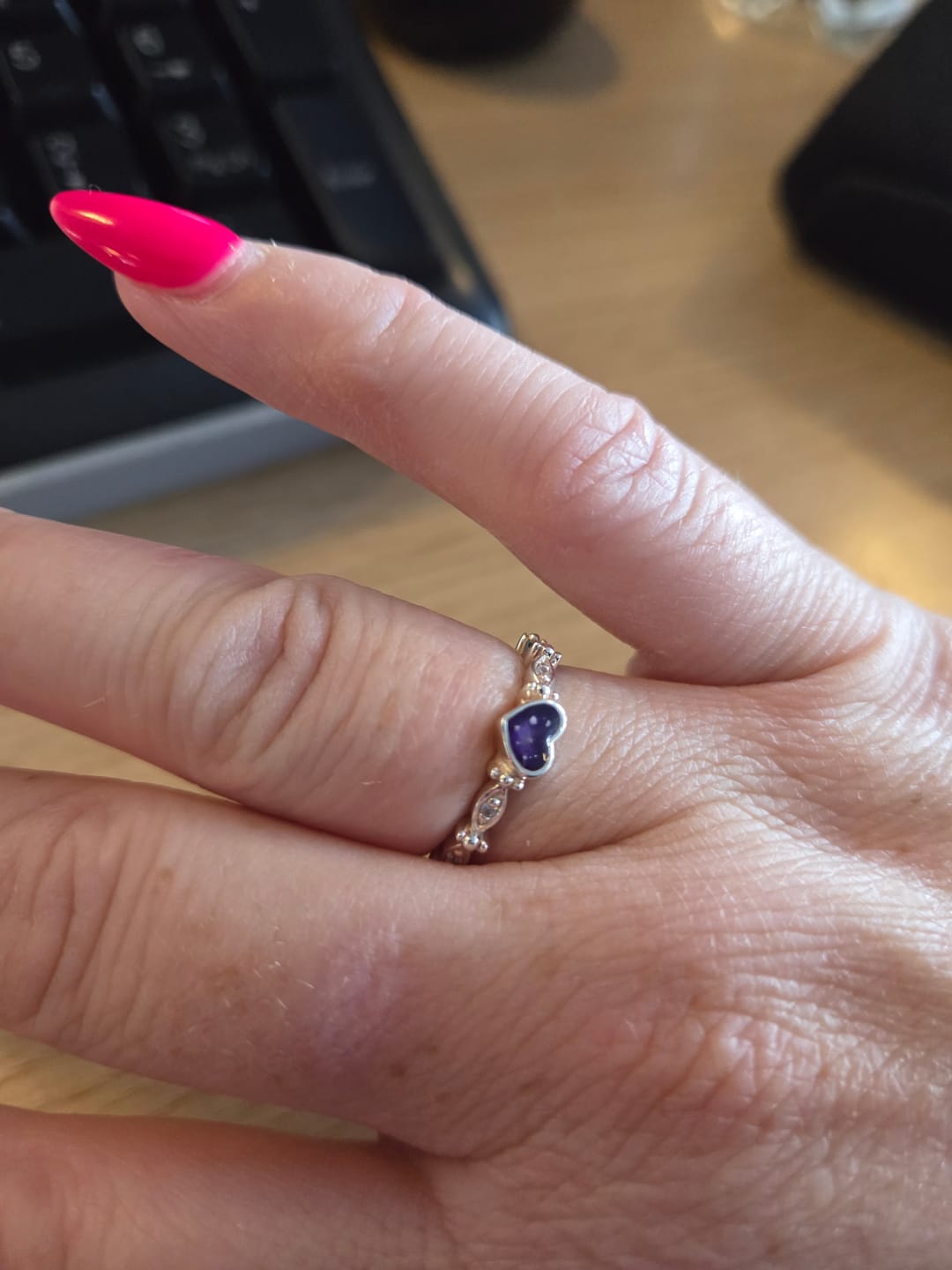 Customer photo review of Dainty heart and almond stones ring