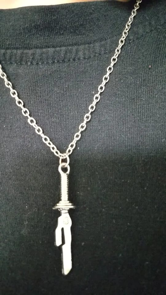 Customer photo review of Collar "Lanza Invertida"