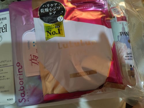 Customer's LuLuLun Over 45 Moist Face Mask in its pink packaging, displayed alongside other beauty products.