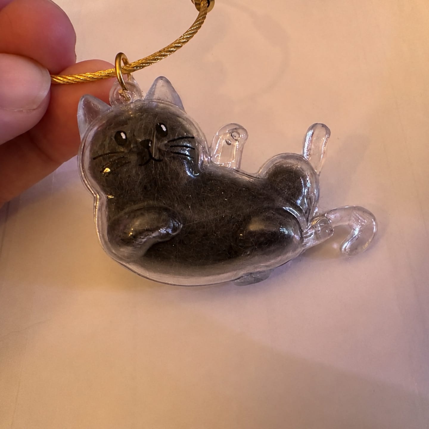Customer photo review of Llavero para guardar pelo de mascota