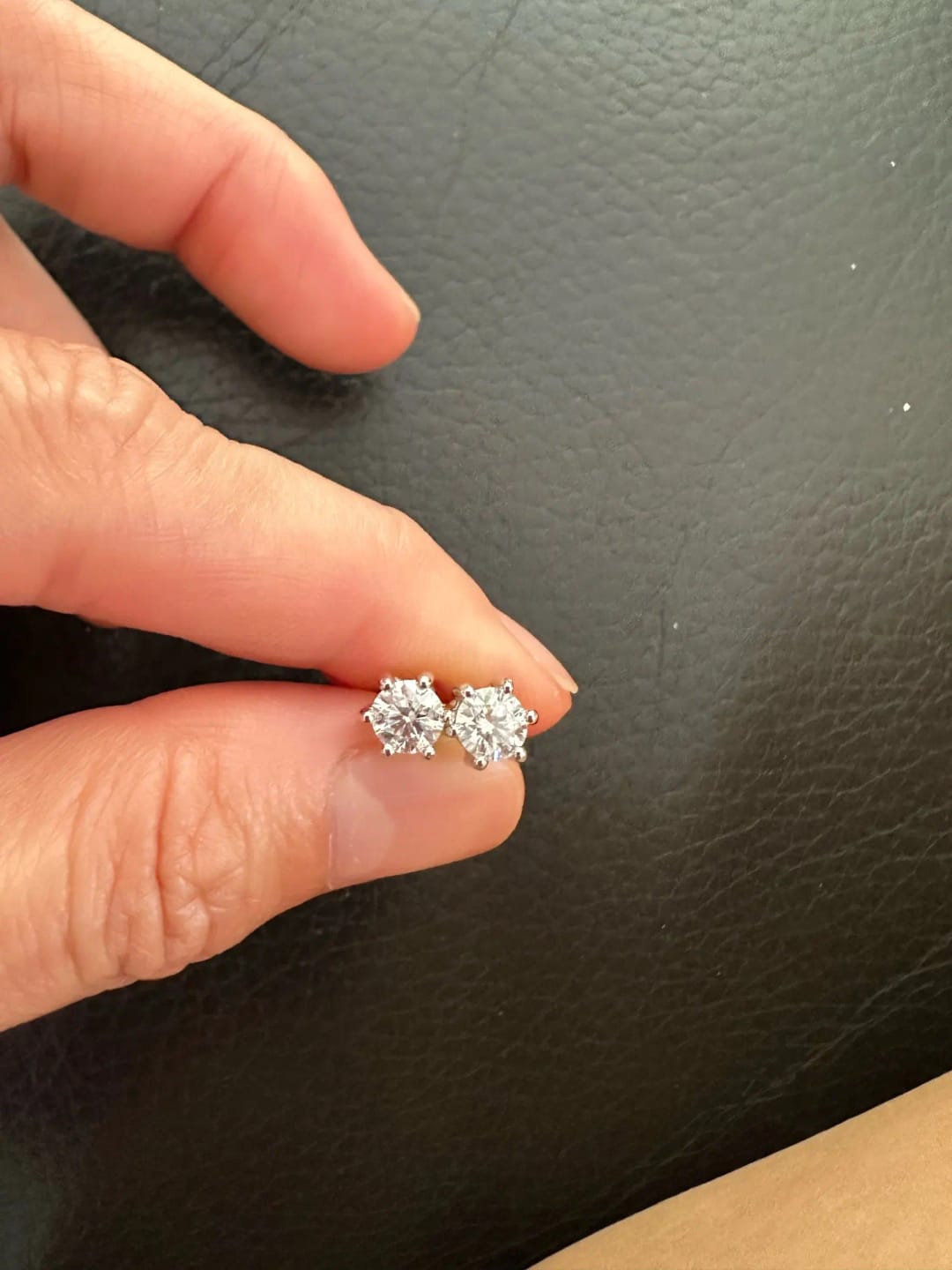 Customer photo review of STERLING SILVER STUD EARRINGS WITH MOISSANITE