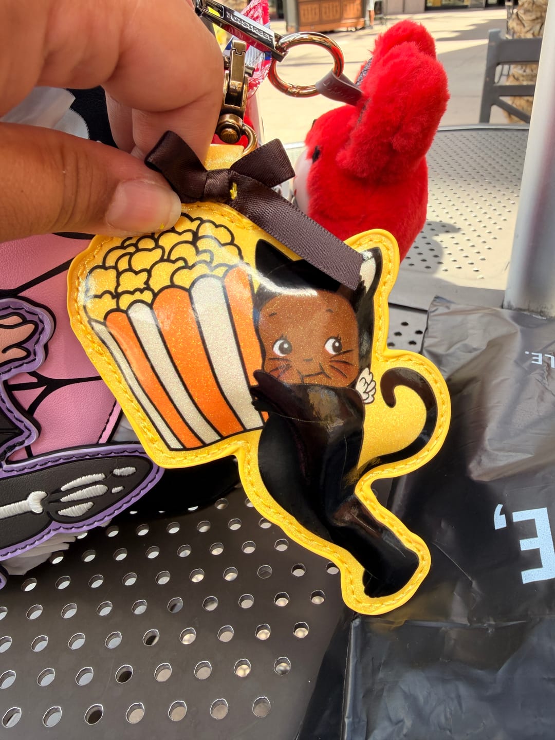Customer photo review of Whatever Makes You Happy Kewpie Creepy Carnival Mystery Box Padded Vinyl Creepy Babies Bag Charms