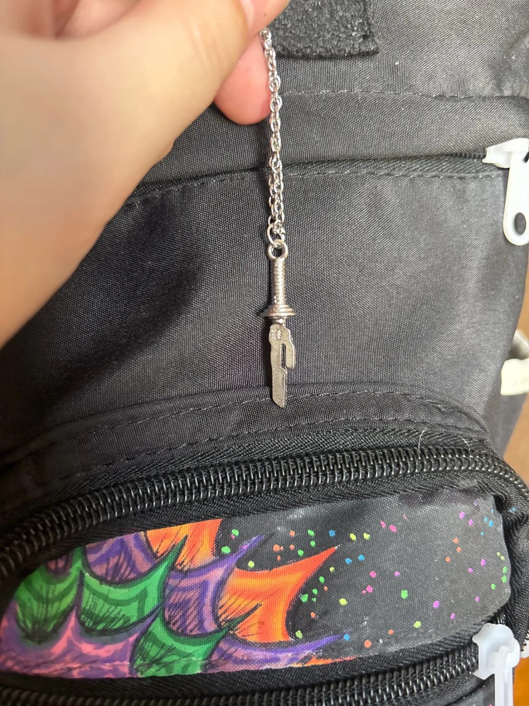 Customer photo review of Collar "Lanza Invertida"
